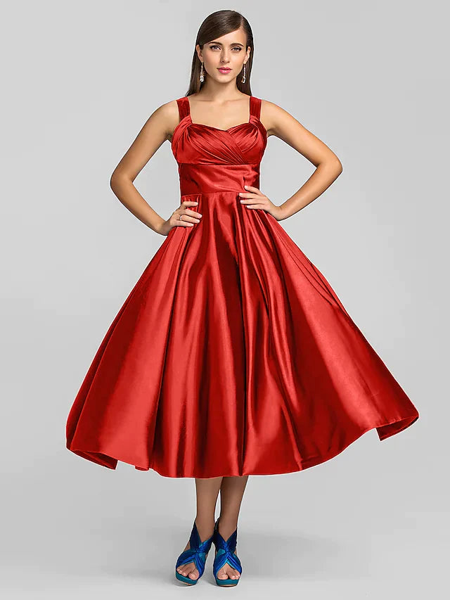 Close-up of the square neckline and smooth stretch satin fabric.
