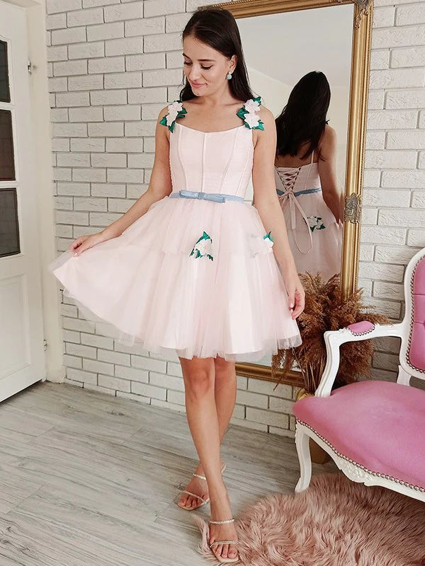 Elegant A-line tulle mini dress with square neck and handmade floral details.