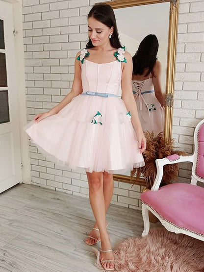 Elegant A-line tulle mini dress with square neck and handmade floral details.