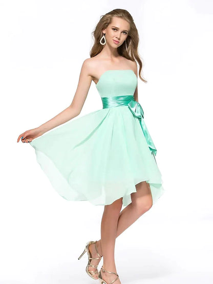Full length view of the A-line strapless cocktail dress.