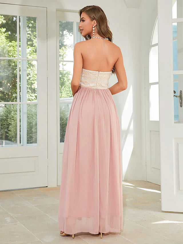Back view of the strapless A-line floral dress, showcasing the backless detail.