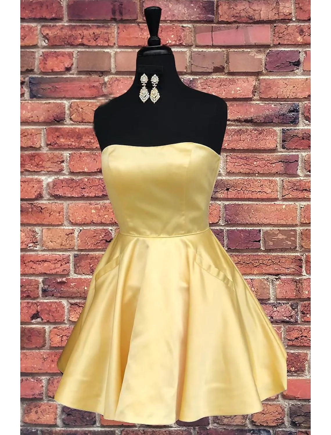 Elegant A-Line strapless satin short dress with sleek pleats.