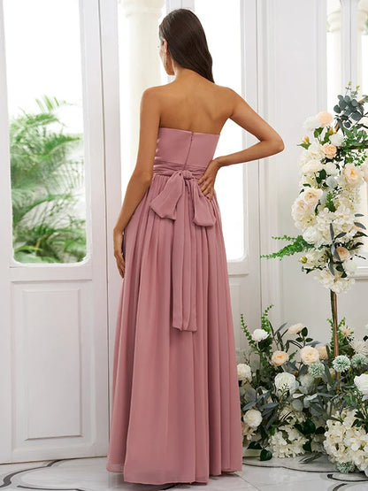 Close-up of the ruffled strapless bodice on a light blue chiffon bridesmaid dress.