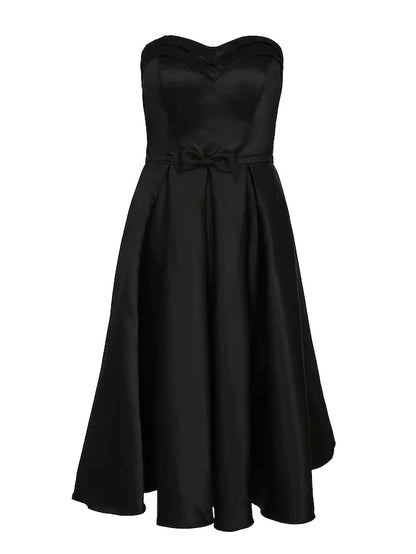 Close-up of the luxurious satin fabric and delicate pleats on the dress.
