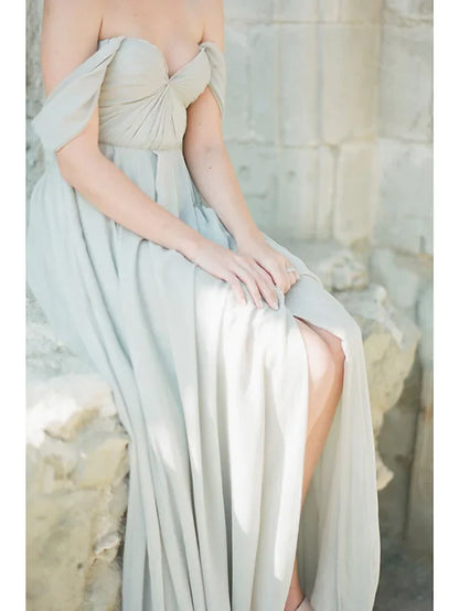 Side view of a woman showcasing the pleats and split front of the A-line bridesmaid dress.