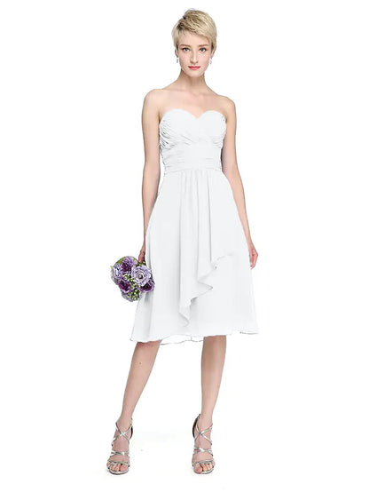 Bridesmaid wearing A-line sweetheart chiffon dress with ruched draping.