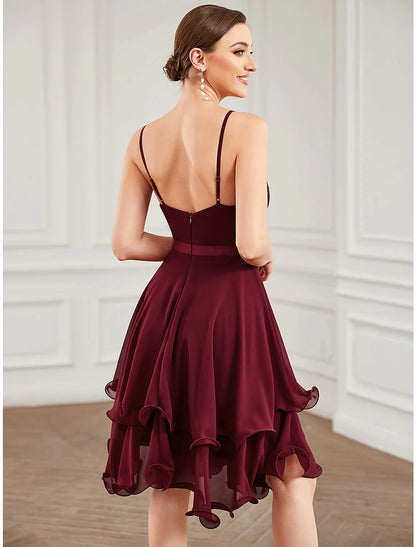 Side view of a model in a pure color A-line short homecoming dress, showcasing the tiered chiffon skirt.