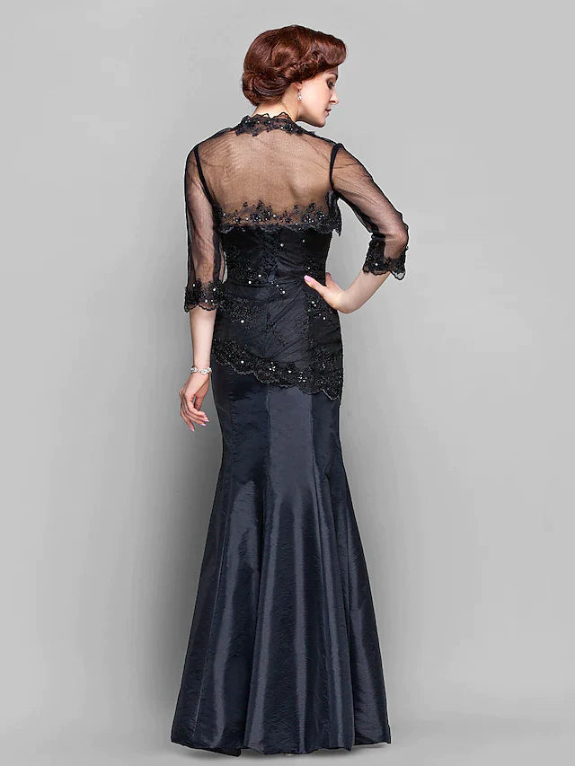 Close-up of the sweetheart neckline and lace bodice of the Mother of the Bride dress.