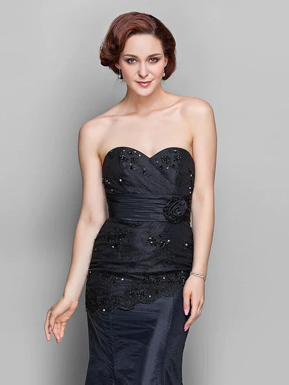 Close-up of the coordinating wrap included with the Mother of the Bride dress.