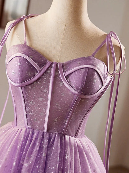 Back view of the purple A-line sweetheart neck tulle lace homecoming dress.