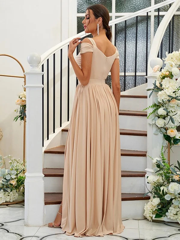 Side view of the elegant floor-length sleeveless bridesmaid gown.