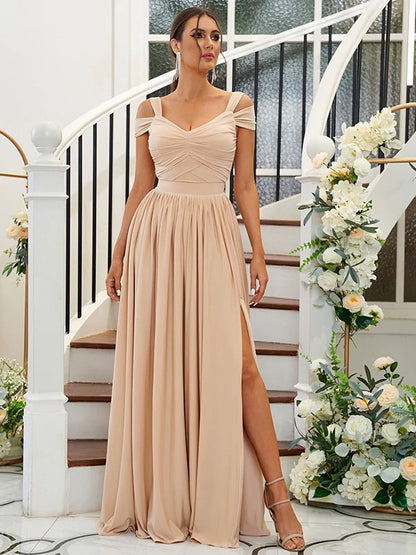 Close-up of the ruffled detail and jersey fabric on the bridesmaid dress.
