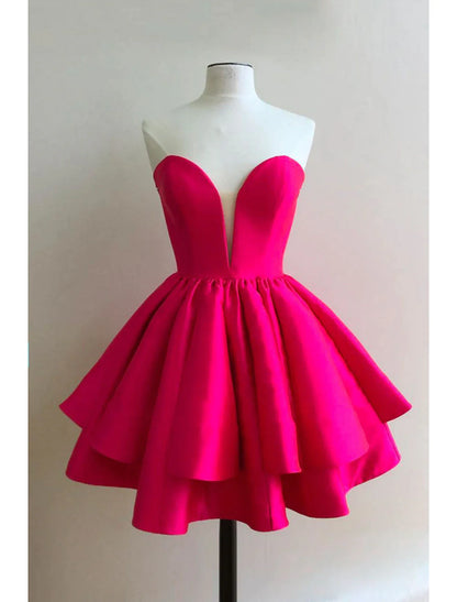 Side profile of a woman in a pink A-line short satin dress with ruffles, suitable for parties.
