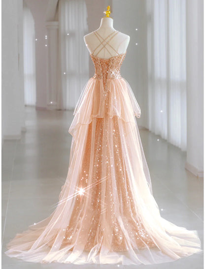 Model showing the back detail of the sleeveless sweetheart sequin dress.