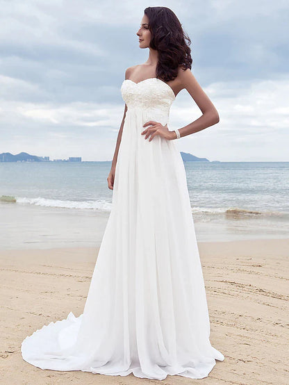 Bride walking in the A-line strapless chiffon wedding dress, showcasing its elegant movement.