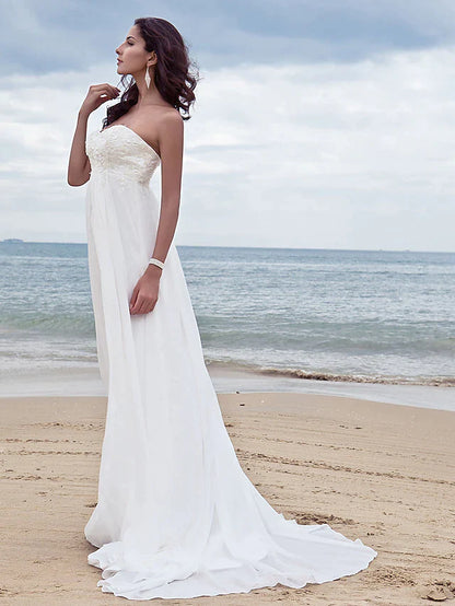 Detailed view of the delicate beading appliques on the bodice of the A-line wedding dress.