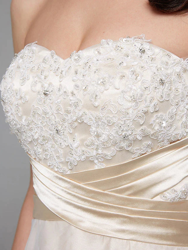 Model gracefully walking in the A-line wedding dress, highlighting the skirt's elegant movement.