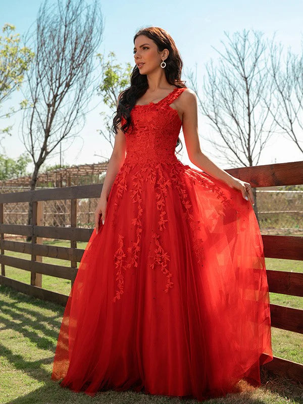 Back view of model in A-line off-shoulder prom dress.
