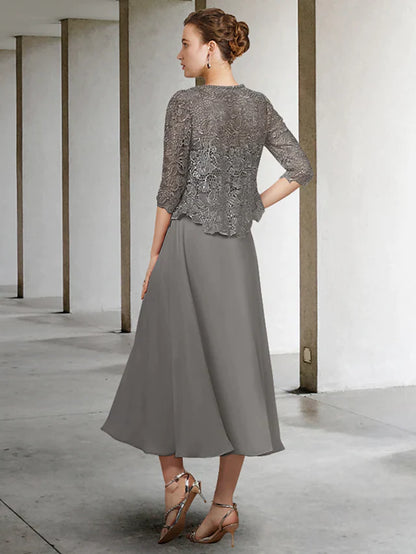 Side view of the A-line two-piece Mother of the Bride dress, showing chiffon lace and pleats.