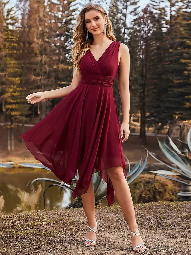 Model wearing an elegant teal A-line V-neck ruched chiffon bridesmaid dress, full length view.