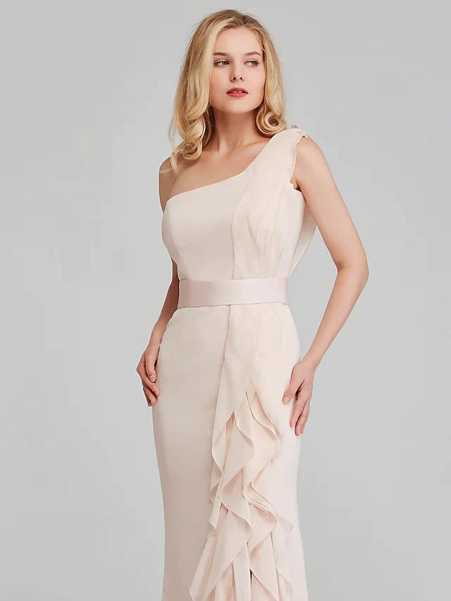Back view of the long teal chiffon bridesmaid dress, showing the flowing skirt.