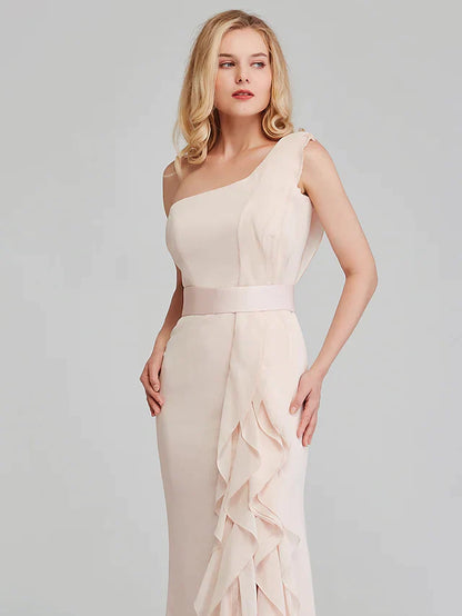 Back view of the long teal chiffon bridesmaid dress, showing the flowing skirt.