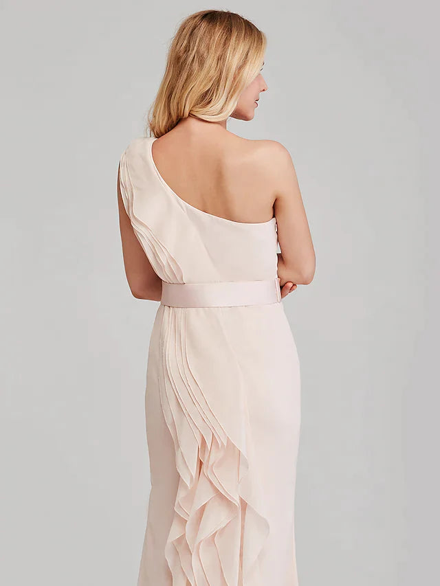 Side profile of a model in the teal A-line bridesmaid dress, highlighting the silhouette.
