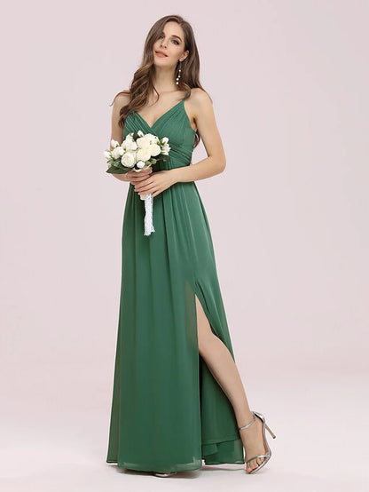 Model wearing an elegant A-line V-neck chiffon bridesmaid dress with ruched bodice.