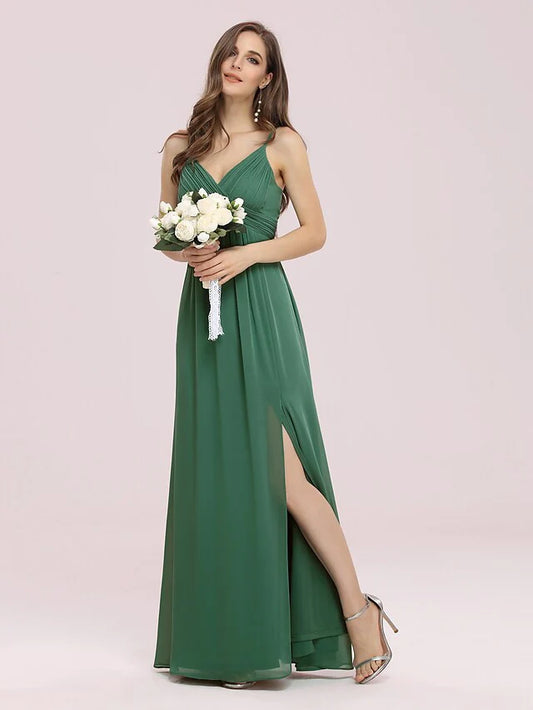 Model wearing an elegant A-line V-neck chiffon bridesmaid dress with ruched bodice.