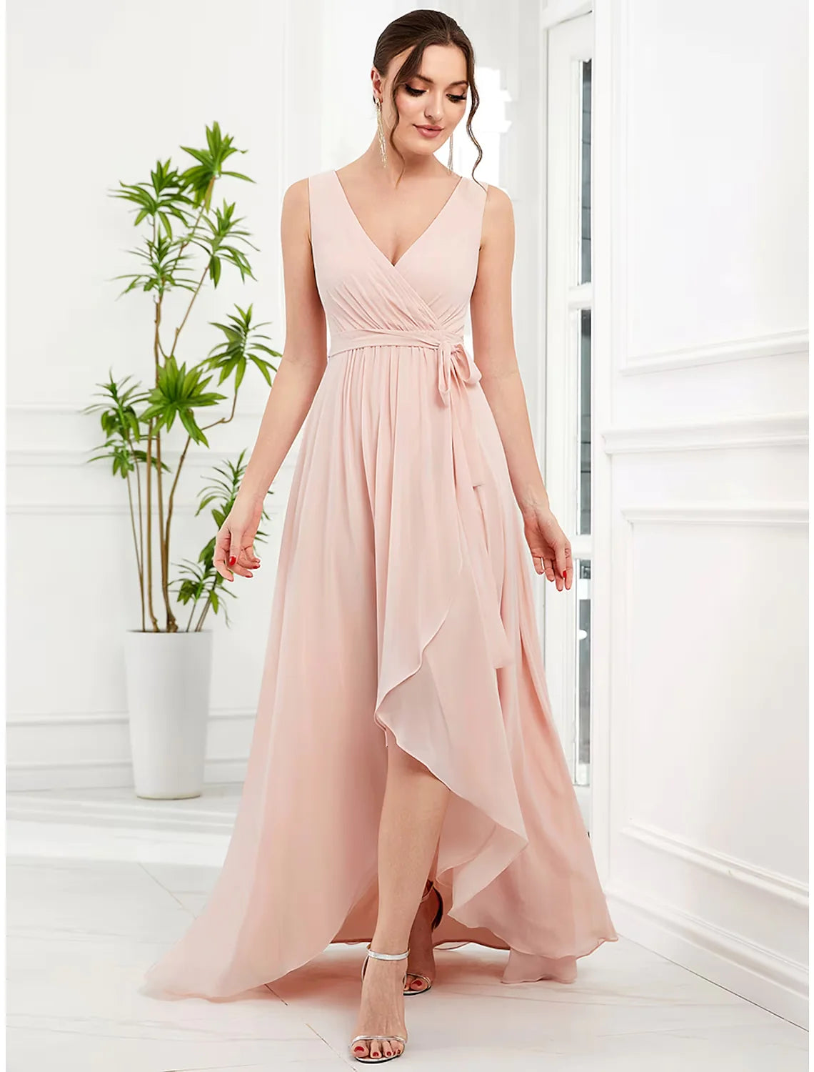 Back view of the elegant V-neck strappy dress.