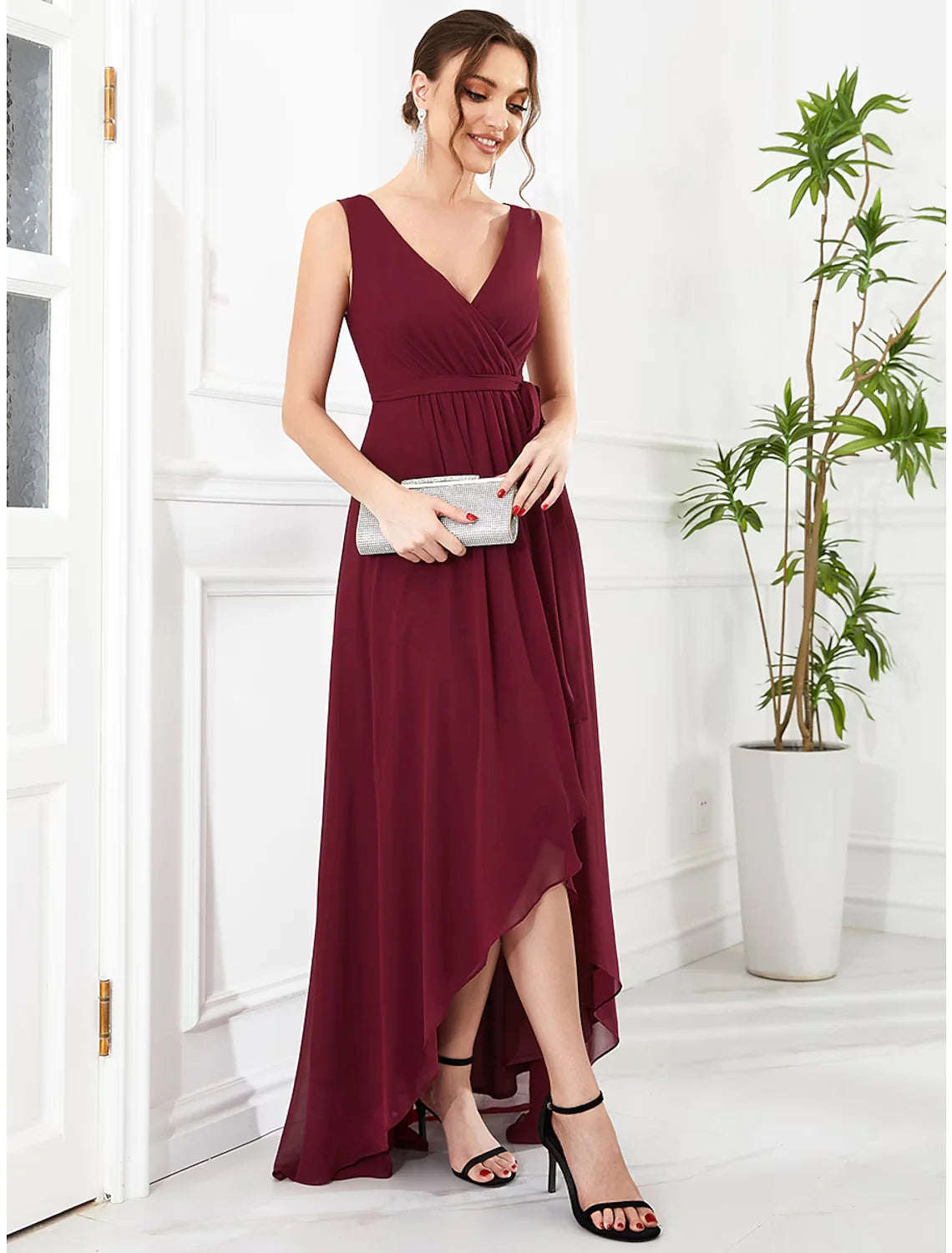 Model posing in the A-line party dress, showing its full length.