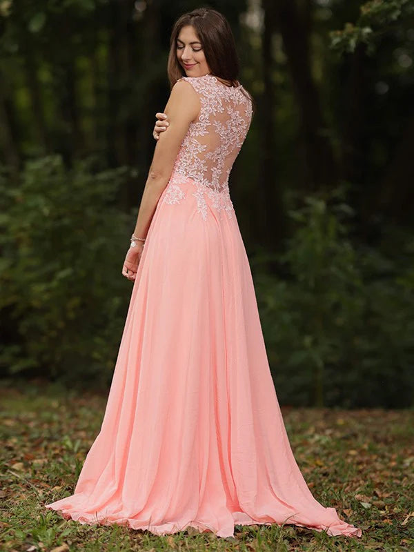 Back view of woman in light blue A-line V-neck chiffon lace prom dress.