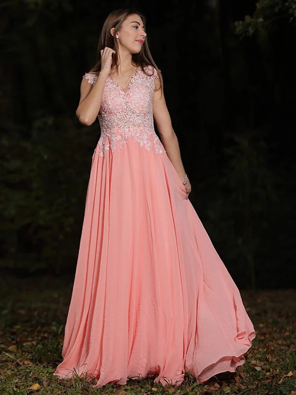 Side view of woman in light blue A-line V-neck chiffon lace prom dress.