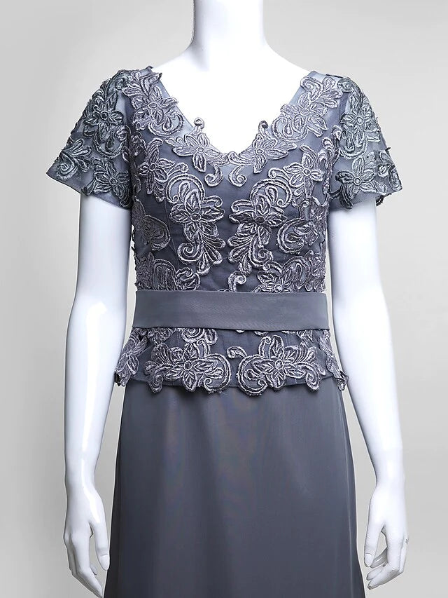 Back view of the elegant V-neck formal gown with short sleeves.