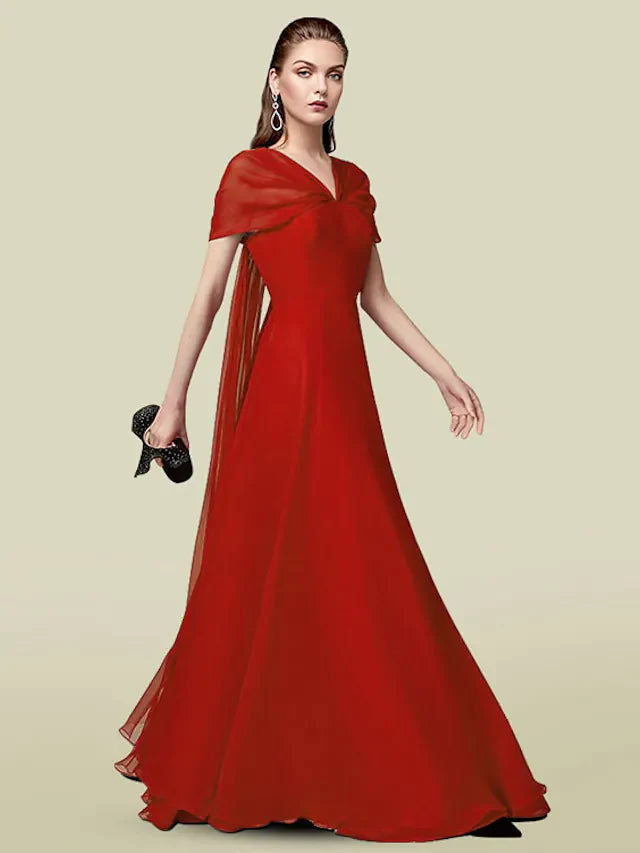 Model wearing an elegant A-line V-neck chiffon dress with short sleeves and pleats, front view.