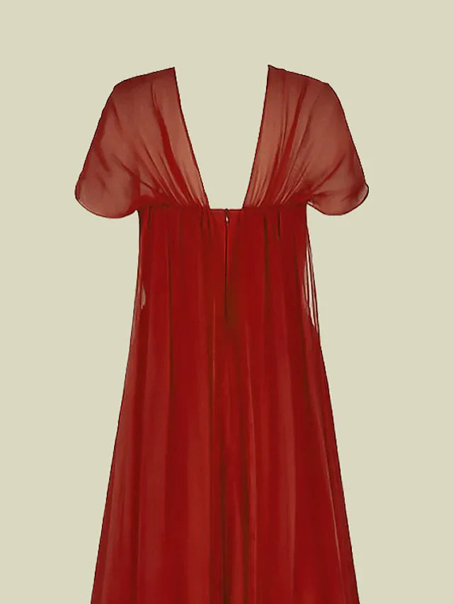 Model posing in the elegant A-line floor-length chiffon dress, side view.