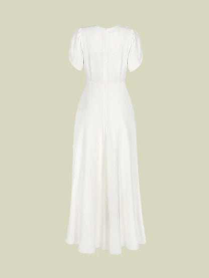 Back view of an elegant light blue A-line V-neck chiffon mother of the bride dress with short sleeves and ruched details.