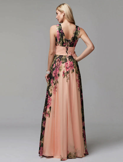 Back view of a woman in a floral A-line V-neck chiffon gown, showcasing the flowing skirt.