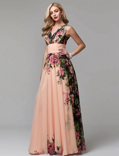 Side view of a woman wearing a floral A-line V-neck chiffon gown.