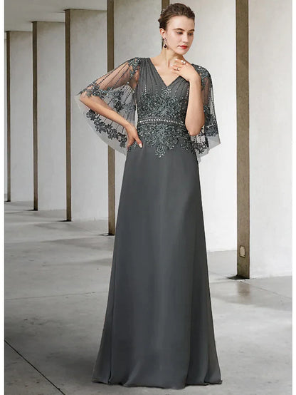 Elegant A-line mother of the bride dress in navy blue with V-neck, half sleeves, and lace details.