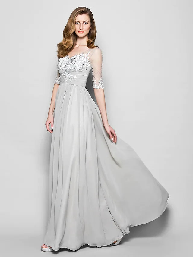 Full view of the elegant Mother of the Bride gown, featuring chiffon tulle fabric and a flowing silhouette.