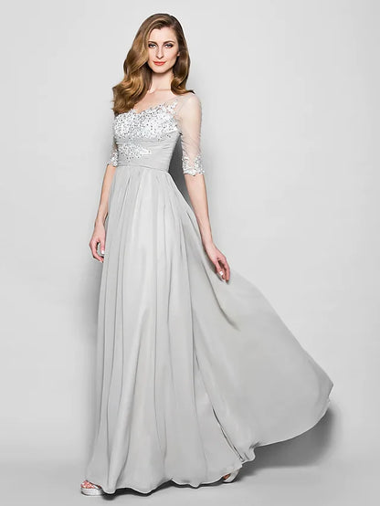 Full view of the elegant Mother of the Bride gown, featuring chiffon tulle fabric and a flowing silhouette.