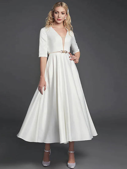 Elegant A-line V-neck half sleeve tea length satin cocktail dress with ribbon pleats.