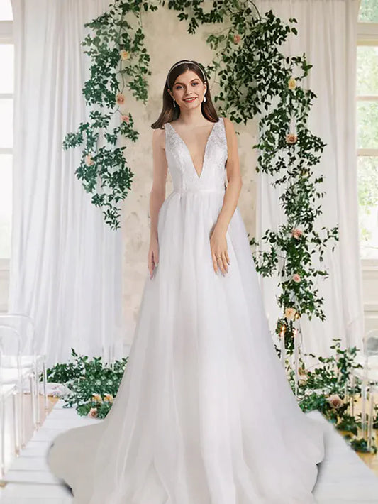 Elegant A-Line V-neck wedding dress with lace and tulle, featuring a court train and sequin details.