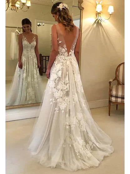 Close-up view of the lace detailing and V-neckline on the A-Line wedding dress.