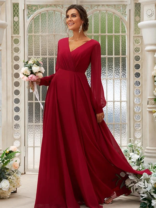 Front view of light blue A-line bridesmaid dress, highlighting V-neck and ruched bodice.