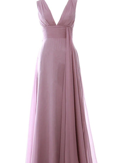 Model wearing an elegant A-line chiffon dress with V-neck and ruched details.