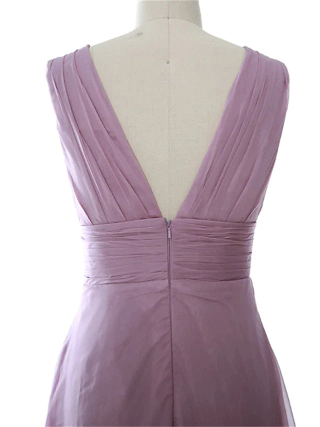 Close-up of the ruched detailing on the elegant A-line dress.