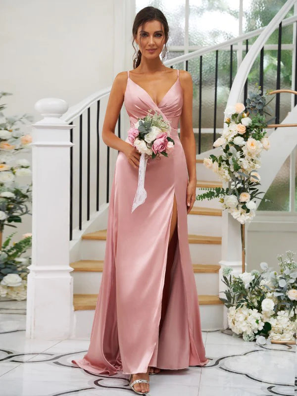 Model in a pink A-line V-neck ruched bridesmaid dress.