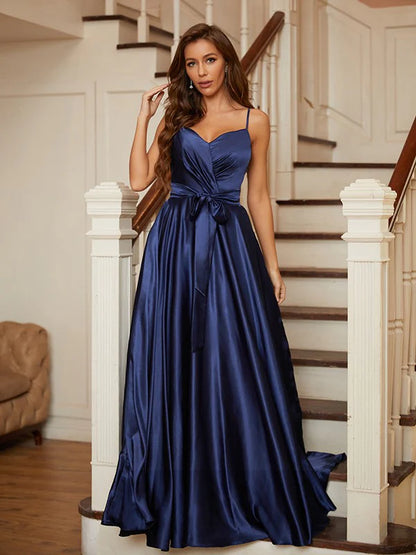 Model wearing a light blue A-line V-neck ruffled prom dress.